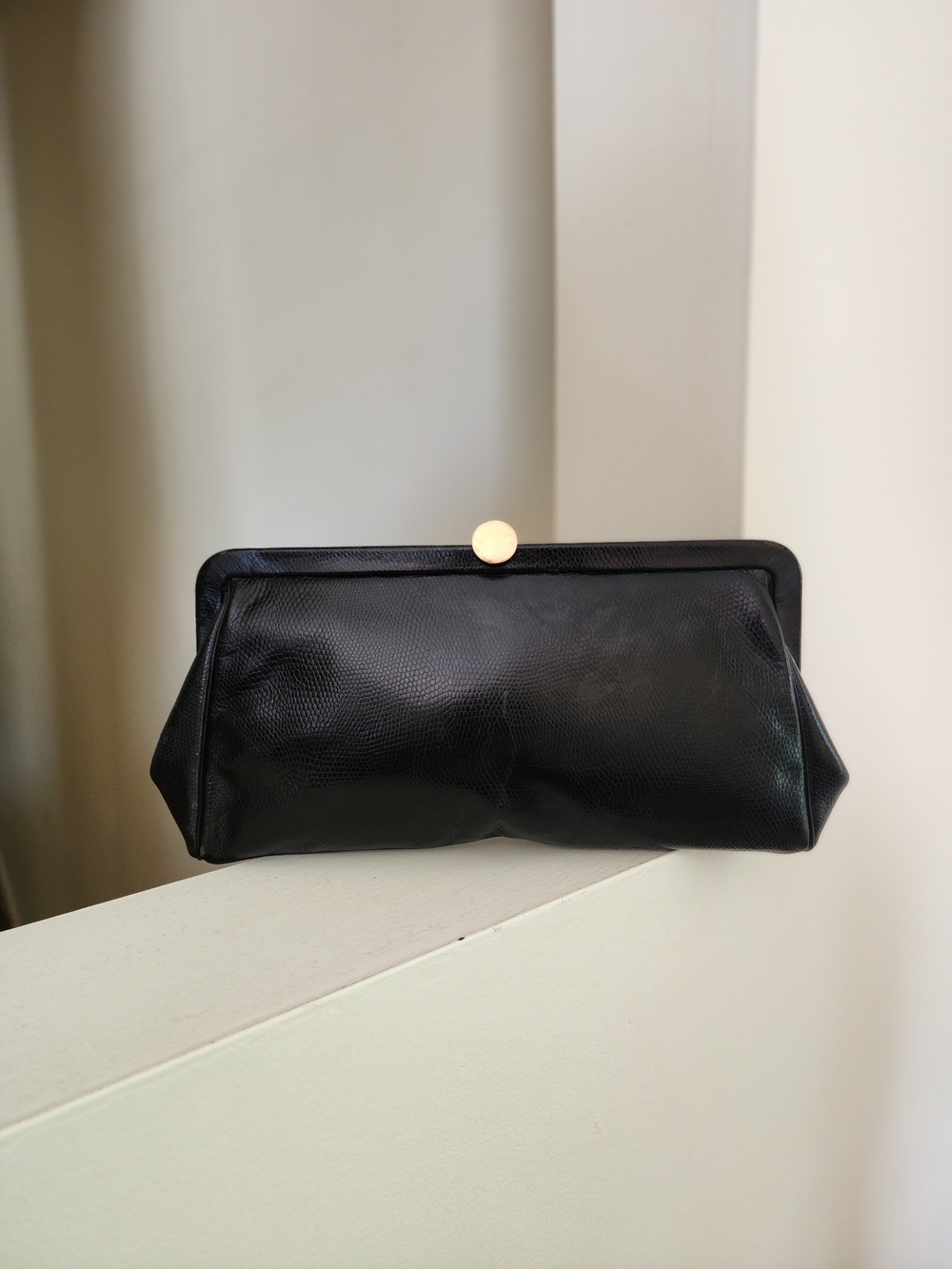 Classic Black Clutch Handbag with Gold Accent